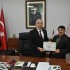 TSD ORHANGAZİ ŞUBE BAŞKANI EMRULLAH AKÇAY’DAN İL MÜDÜRÜNE ONURSAL ÜYELİK BELGESİ!